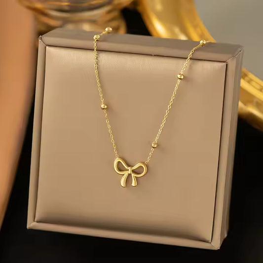 Elegant Bow Charm Necklace – 18K Gold Plated